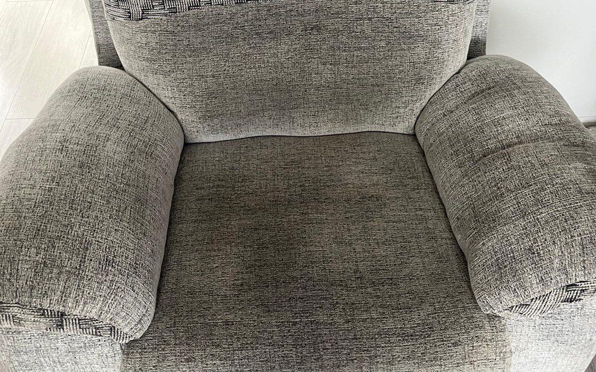 The same armchair before cleaning