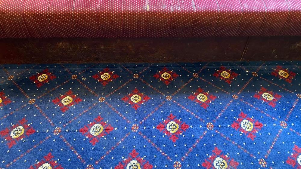 The club's banquette seating and carpet after cleaning &mdash; colours vivid again