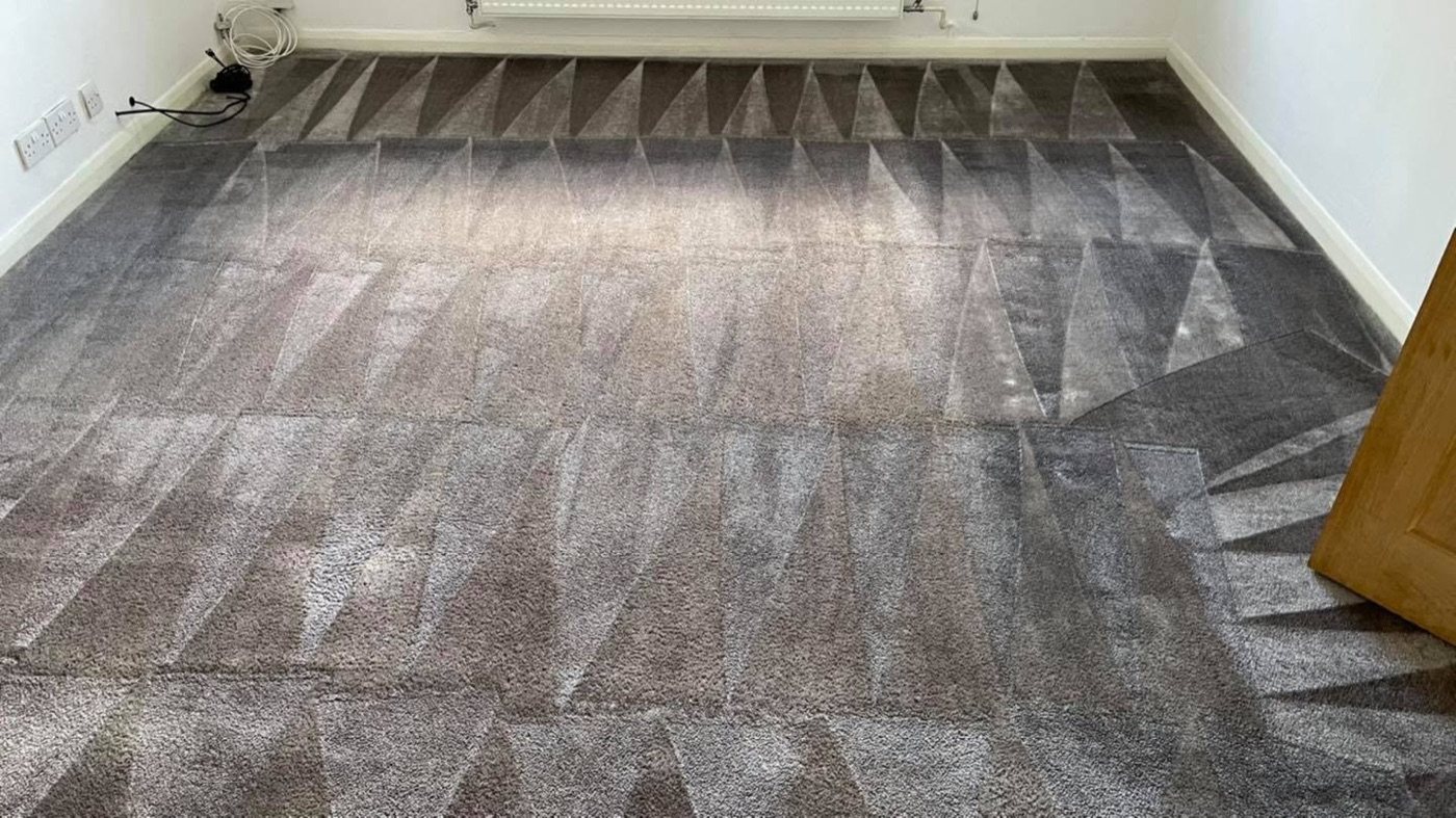 A grey carpet after professional cleaning by Jay's Cleaning