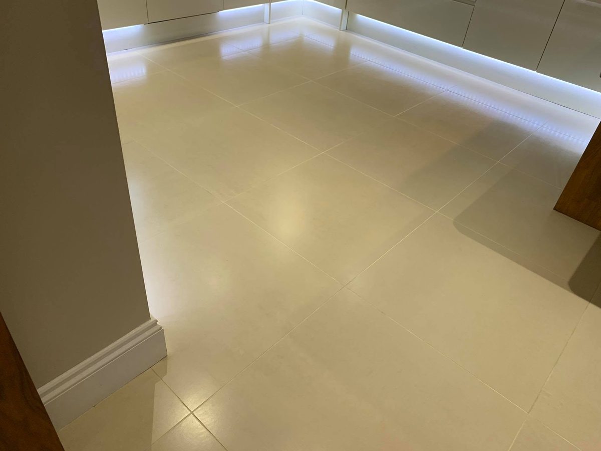 The same kitchen floor after &mdash; grout white again