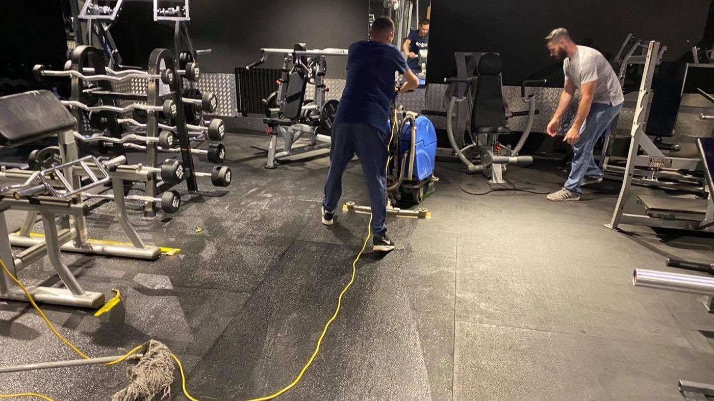 Jay's Cleaning cleaning a gym sports-hall floor